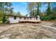 A backyard with lots of space for entertaining on a white painted brick home at 2011 W Starmount Way, Decatur, GA 30032