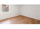 Empty bedroom with hardwood floors and natural light, ready for customization at 2011 W Starmount Way, Decatur, GA 30032
