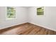 Empty bedroom featuring hardwood floors, natural light, and a bright space at 2011 W Starmount Way, Decatur, GA 30032