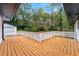 A well-maintained wooden deck with white lattice fencing offers a relaxing outdoor space at 2011 W Starmount Way, Decatur, GA 30032
