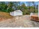 Detached garage with concrete driveway, steps leading to deck at 2011 W Starmount Way, Decatur, GA 30032