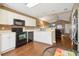 Kitchen featuring stainless appliances, modern cabinets, and an adjoining dining area at 220 Turnstone Rd, Stockbridge, GA 30281