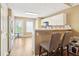 Bright, eat-in kitchen with white cabinets, modern appliances, and a cozy breakfast bar at 220 Turnstone Rd, Stockbridge, GA 30281