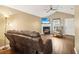 Inviting living room with a fireplace, hardwood floors, and a cozy seating area at 220 Turnstone Rd, Stockbridge, GA 30281