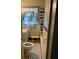 Bathroom featuring patterned floor tile and a shower-tub combo at 2689 Knox Ne St, Atlanta, GA 30317