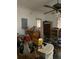 A cluttered room with wood floors and various items stored throughout at 2689 Knox Ne St, Atlanta, GA 30317