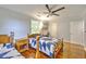 Bright bedroom offers hardwood floors, ample natural light, and a dedicated study area at 2944 Berry Rd, Loganville, GA 30052