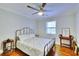 Inviting bedroom with hardwood floors, providing a peaceful retreat with classic furnishings at 2944 Berry Rd, Loganville, GA 30052