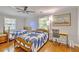 Comfortable bedroom featuring hardwood floors, matching twin beds, and a dedicated study area at 2944 Berry Rd, Loganville, GA 30052