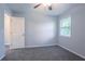 Bedroom with gray walls, neutral carpet and a ceiling fan is highlighted in this image at 5795 Deerfield Trl, Atlanta, GA 30349