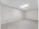 Unfinished basement room with bright white paint and neutral flooring at 1605 Little Lisa Ln, Snellville, GA 30078