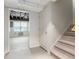 Unfinished basement space with exposed ceiling and access to storage room at 1605 Little Lisa Ln, Snellville, GA 30078