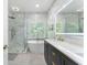 Luxurious bathroom features a soaking tub and walk-in shower at 1605 Little Lisa Ln, Snellville, GA 30078