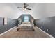 Spacious bedroom with grey walls, high ceilings, ceiling fan and plush carpeting at 1605 Little Lisa Ln, Snellville, GA 30078