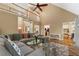Open-concept living area with modern decor, a large sectional, and easy access to the kitchen at 1605 Little Lisa Ln, Snellville, GA 30078