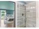 View of the bathroom showing the shower and part of the primary bedroom at 185 Pamela Nw St, Marietta, GA 30064