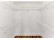 Walk in closet featuring hardwood floors, with hanging storage at 185 Pamela Nw St, Marietta, GA 30064