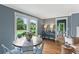Bright dining room with large windows and hardwood floors at 185 Pamela Nw St, Marietta, GA 30064