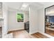 The home's modern laundry room features new appliances, natural light, and convenient access to living areas at 185 Pamela Nw St, Marietta, GA 30064