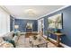 Inviting living room with hardwood floors, a comfortable sofa, and an open layout perfect for entertaining at 185 Pamela Nw St, Marietta, GA 30064