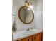 Bathroom with vanity and decorative mirror at 1850 Francis Sw Rd, Conyers, GA 30094