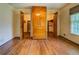 This spacious bedroom has hardwood floors and two closets or dressing rooms, plus built-in wardrobe at 1850 Francis Sw Rd, Conyers, GA 30094