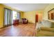 Bright living room with hardwood floors, comfortable seating, and natural light at 1850 Francis Sw Rd, Conyers, GA 30094