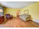 Open living room with hardwood floors, natural light, and plenty of room for furnishings at 1850 Francis Sw Rd, Conyers, GA 30094