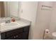 Bathroom featuring a sleek vanity with sink, mirror, and contemporary fixtures for a modern touch at 3796 Kensingwood Trce, Decatur, GA 30032