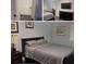 Bedroom with walk-in closet and a television with dresser at 3796 Kensingwood Trce, Decatur, GA 30032