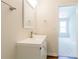 Bright bathroom featuring a stylish vanity with modern fixtures at 3990 Howell Park Rd, Duluth, GA 30096