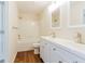 Bathroom featuring dual sinks and a tub and shower combination at 3990 Howell Park Rd, Duluth, GA 30096