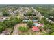 Aerial view of the community including tennis courts, pool, playground, and clubhouse at 487 Carmichael Cir, Canton, GA 30115