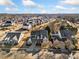 Scenic aerial view showcases a neighborhood, highlighting the homes, green spaces, and community layout on a clear day at 487 Carmichael Cir, Canton, GA 30115