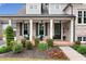 Charming brick home with landscaped yard and inviting front porch at 487 Carmichael Cir, Canton, GA 30115