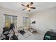 Home gym featuring an exercise bike, treadmill, and plenty of open space at 487 Carmichael Cir, Canton, GA 30115