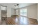 Inviting living room with hardwood floors, large windows, and plenty of natural light, great for entertaining at 2509 Browns Mill Se Rd, Atlanta, GA 30354