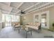 Covered porch with ceiling fan and access to the home at 2509 Browns Mill Se Rd, Atlanta, GA 30354
