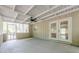 Covered porch with ceiling fan and access to the home at 2509 Browns Mill Se Rd, Atlanta, GA 30354