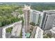 Elevated view of the high rise property with multiple floors, balconies, and parking at 3481 Lakeside #901 Ne Dr, Atlanta, GA 30326