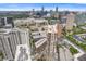 A scenic aerial view of the building and surrounding city skyline with other high-rise buildings in the area at 3481 Lakeside #901 Ne Dr, Atlanta, GA 30326