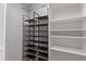 Closet with shelves and clothing racks providing organized storage solutions at 3481 Lakeside #901 Ne Dr, Atlanta, GA 30326