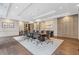 Conference room with large table, comfortable seating, modern lighting, and built in cabinets at 3481 Lakeside #901 Ne Dr, Atlanta, GA 30326