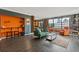 Cozy living room features a bar area, exposed brick, and lots of natural light at 3481 Lakeside #901 Ne Dr, Atlanta, GA 30326