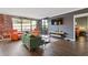 Bright living room with adjacent bedroom and balcony access, featuring a cozy design at 3481 Lakeside #901 Ne Dr, Atlanta, GA 30326