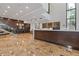 The building's front desk, staircase, and marble floors give a welcoming atmosphere at 3481 Lakeside #901 Ne Dr, Atlanta, GA 30326