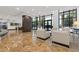 Lobby area with marble floors, seating area with comfortable chairs, and large windows at 3481 Lakeside #901 Ne Dr, Atlanta, GA 30326