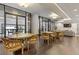 Sitting area featuring multiple tables, chairs and lounge area with a TV at 3481 Lakeside #901 Ne Dr, Atlanta, GA 30326