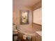 Bathroom featuring soaking tub with stylish mirror, storage, and natural light creating a spa-like experience at 3606 Packhorse Run, Marietta, GA 30066
