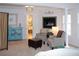 Bedroom featuring fireplace, seating area, and en suite bathroom with refined finishes at 3606 Packhorse Run, Marietta, GA 30066